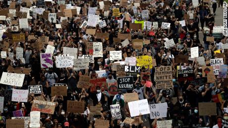 More than 1,000 health professionals sign a letter saying not to use coronavirus concerns as an excuse to stop protests