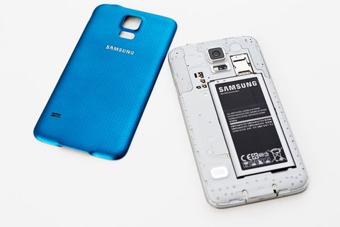 Samsung Galaxy S5 smartphone, back removed, showing battery, Sim card