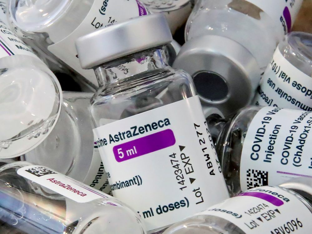 Empty vials of Oxford/AstraZeneca's COVID-19 vaccine are pictured amid a vaccination campaign in Bierset, Belgium, on March 17, 2021.