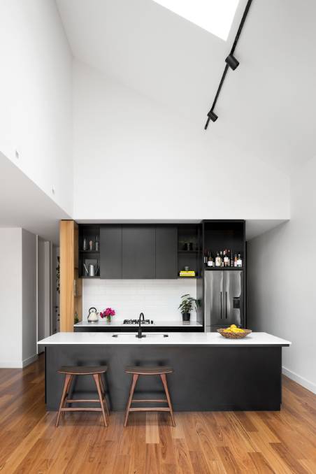 Use of space: Bespoke timber elements feature indoors, creating a Scandi-style feel with minimalist features adding to the contemporary look. The Butler's Pantry is in the void at the right.